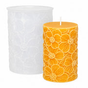 Silicone mold for a pillar candle with embossed daisies and an example of a finished decorative candle - Canary Islands Shop - Santa Cruz de Tenerife - Las Palmas de Gran Canaria 